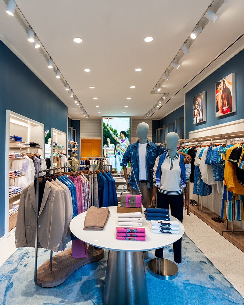 Interior display with mannequins and Harmont & Blaine apparel.