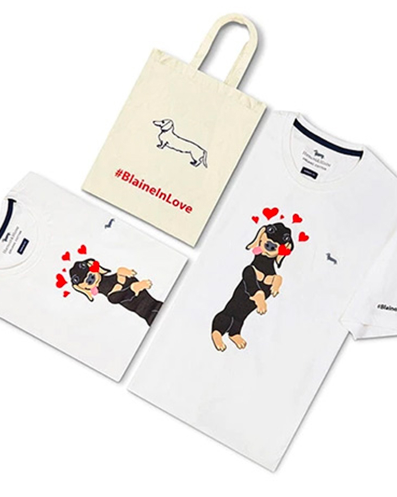 Harmont&Blaine celebra la festa degli innamorati lanciando una nuova t-shirt in edizione limitata realizzata in collaborazione con Jay C. Lohmann. La personalizzazione della t-shirt trae ispirazione dalla serie Casual Conversations, nuovo spazio creativo ed espressivo che il marchio ha appena inaugurato con l&rsquo;artista americano invitandolo a &lsquo;giocare&rsquo; con il bassotto iconico Blaine. Per l&rsquo;Episodio 1 della serie, Lohmann ha disegnato una gallery di 14 bassotti cartoonesque in cui ogni cagnolino rappresenta un mood o un&rsquo;emozione speciale che lo rende quasi umano e ancora pi&ugrave; adorabile.